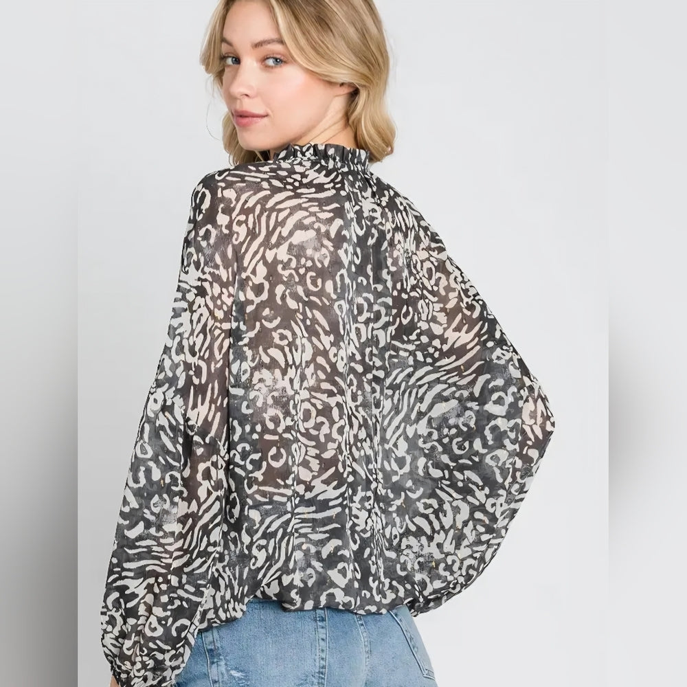 Women's Black and White Patterned Blouse
